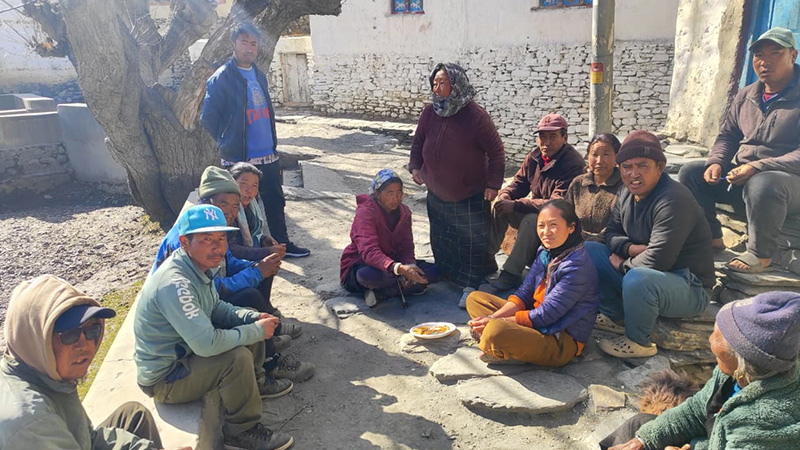 Community members coordinating agricultural work and water management in Dhakarjong